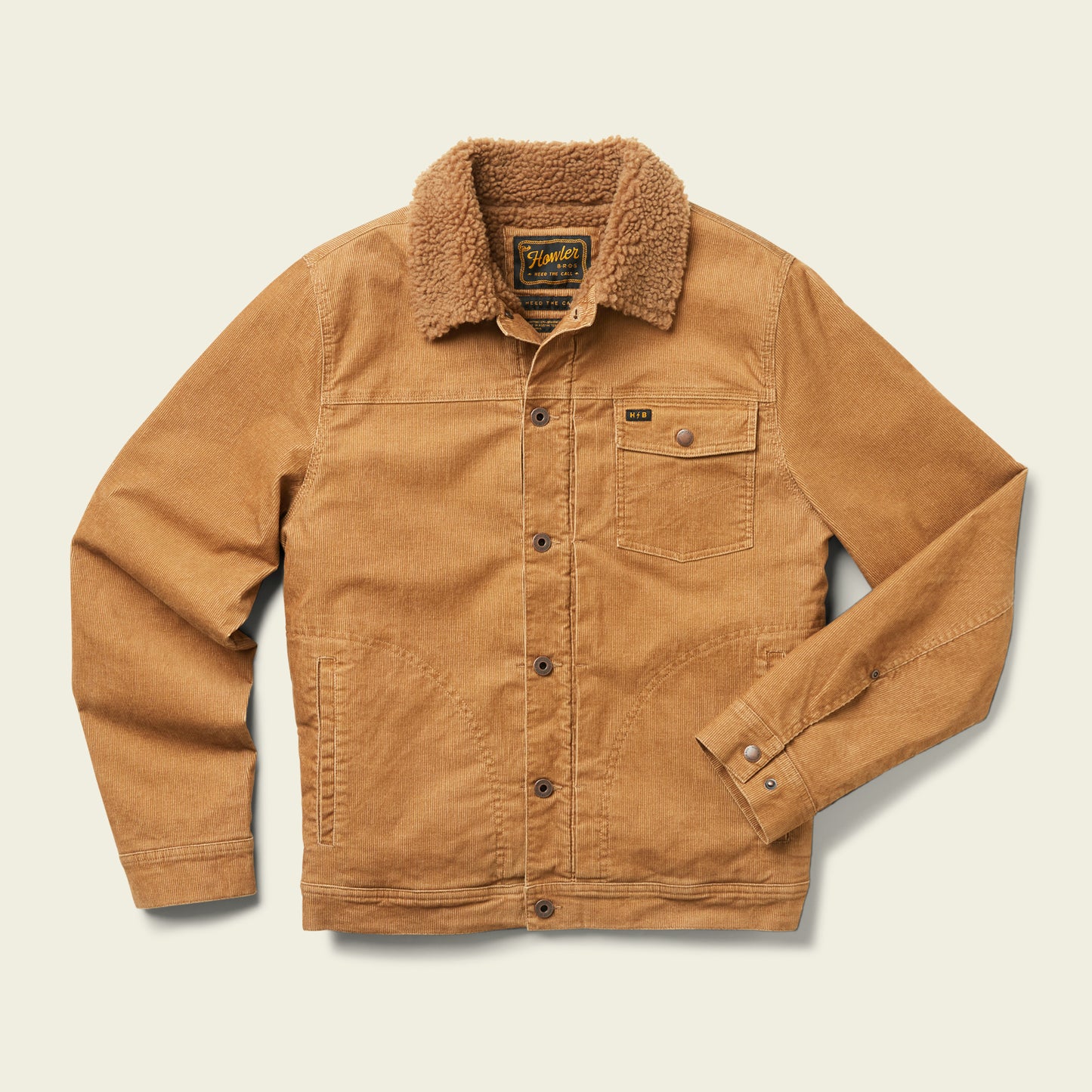 A tan Fuzzy Depot Jacket with a brown sherpa collar, button front, single chest pocket with button, and two side pockets is displayed on a light background. - View 1