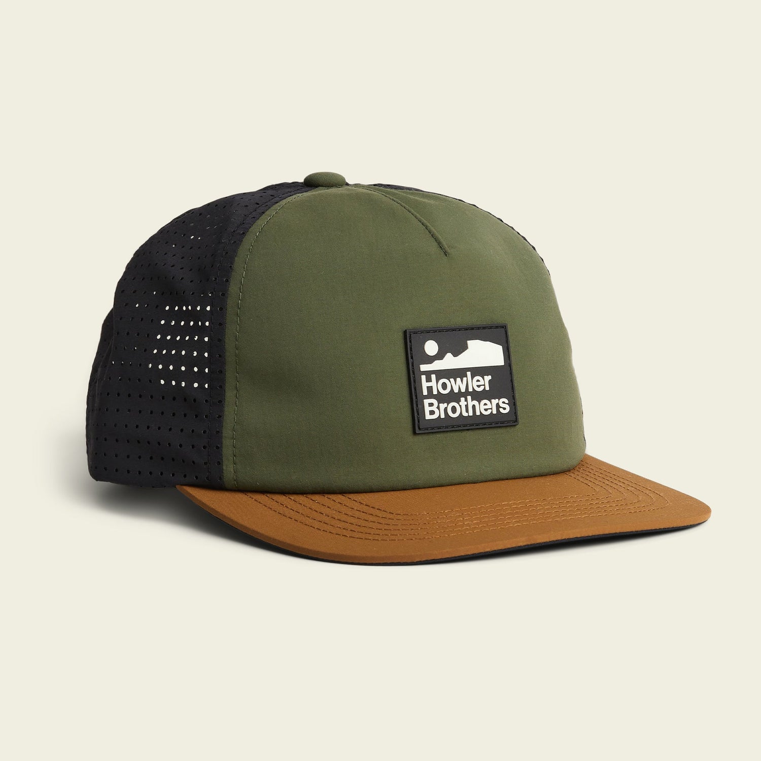 Green and brown baseball cap with black mesh sides, brown brim, and a front patch that reads Howler Brothers in white text—perfect as a breathable tech hat for your outdoor adventures.