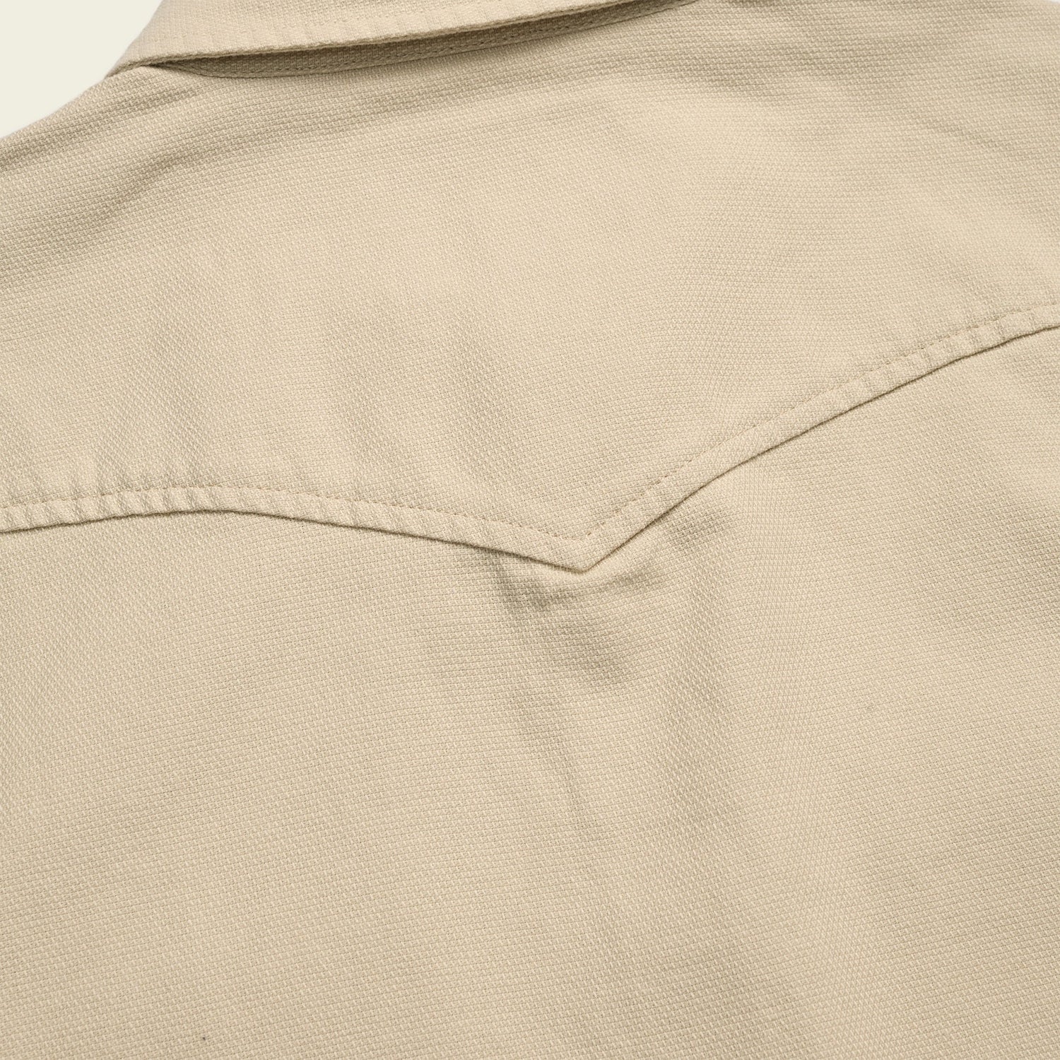 Close-up of the back yoke and collar of a beige Novato Shirt, showing textured canvas fabric and visible stitching details inspired by classic western shirt design. - View 6