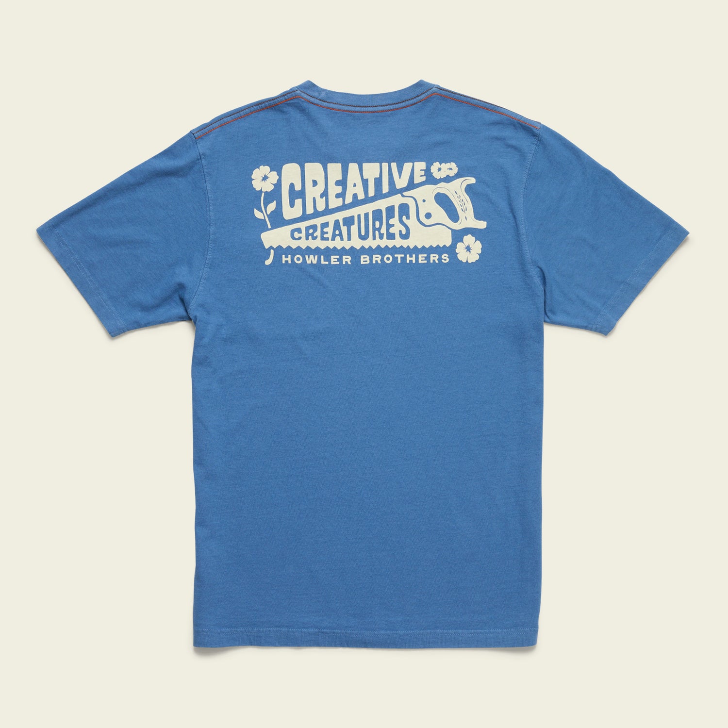 Blue t-shirt with white graphic on the back featuring the words CREATIVE CREATURES HOWLER BROTHERS, a stylized animal, and flower illustrations—perfect for fans of vintage t-shirts and experimental artwork. - View 1