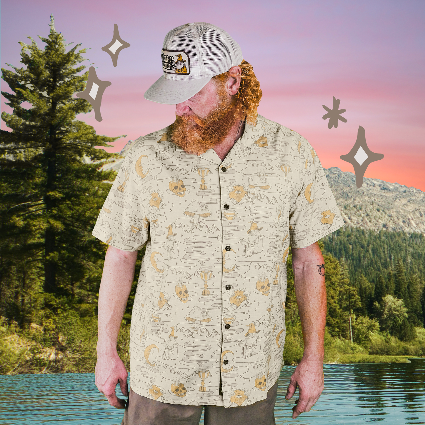 A bearded man in a camp collar, patterned short-sleeve shirt and white cap stands by a lake with trees and mountains behind him, cartoon star shapes around. The sky glows pink and orange at sunset. - View 2