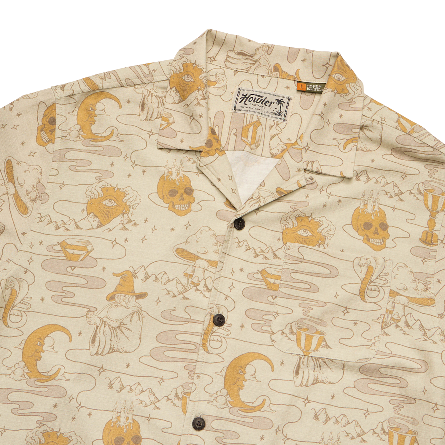 Beige button-up shirt in soft slub fabric with a mystical-themed print inspired by vintage Hawaiian shirts—skulls, crescent moons, snakes, and more in light brown and gold. Features a camp collar and visible Howler brand label inside the collar. - View 3