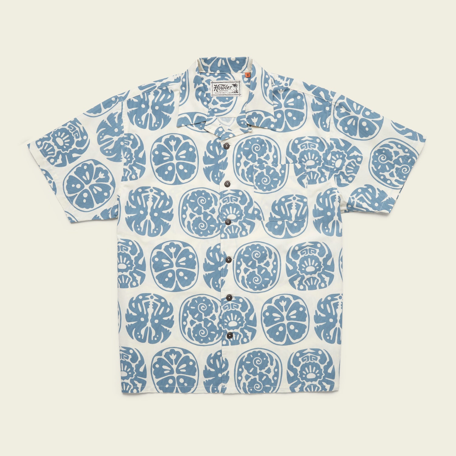 A short-sleeved camp collar shirt featuring a white background with a blue abstract Sea Idols print and circular pattern throughout. The shirt has a relaxed, casual style inspired by vintage Hawaiian shirts. - View 1