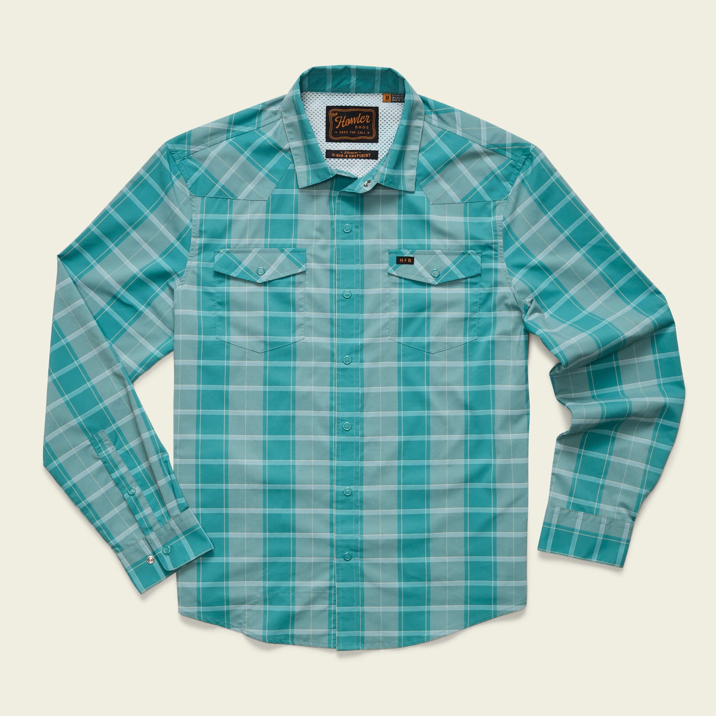 A long-sleeved, button-up lightweight stretch shirt with a turquoise and white plaid pattern, featuring two chest pockets with button flaps and a vented yoke, laid flat on a light background. - View 16