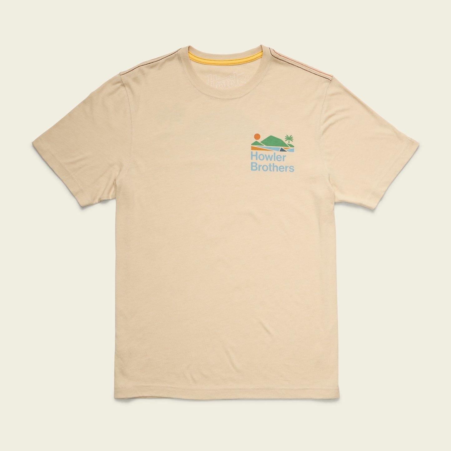 Beige short-sleeve t-shirt with a small colorful graphic of a sun, water, and palm tree above the words Howler Brothers on the left chest. Made from a soft cotton-poly blend for maximum comfort, with subtle orange stripes on the shoulders. - View 3